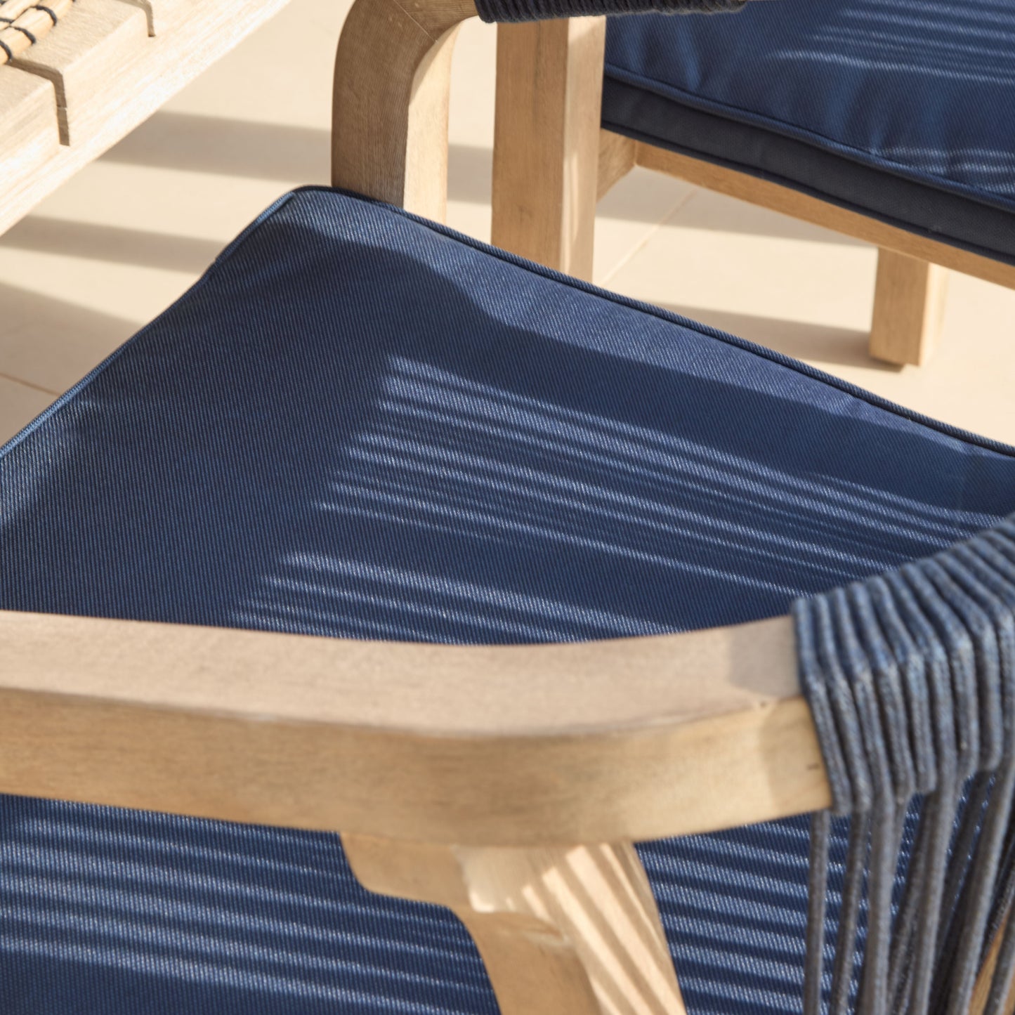 Saffron 6 Seater Extending Wooden Garden Dining Set with Shiro Navy Rope Chairs