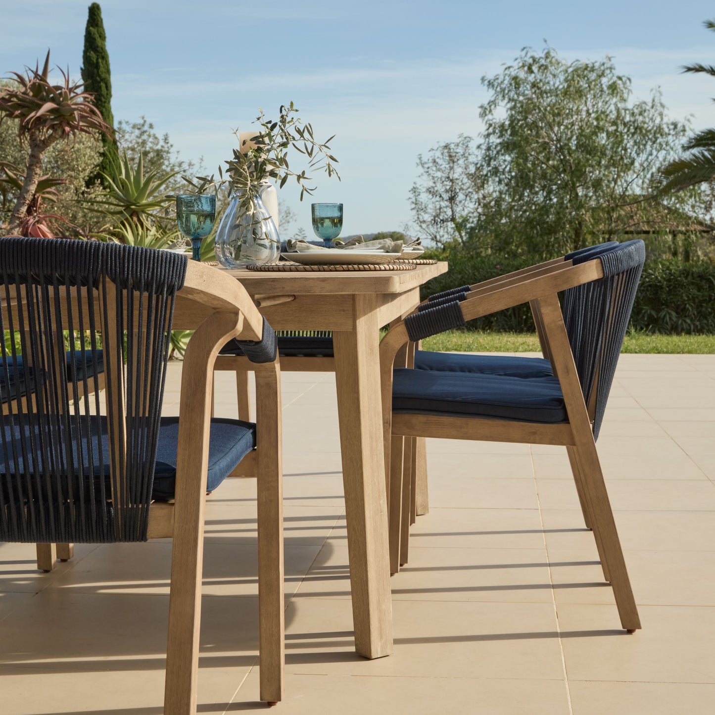 Saffron 6 Seater Extending Wooden Garden Dining Set with Shiro Navy Rope Chairs